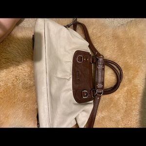 Coach handbag with adjustable crossbody strap